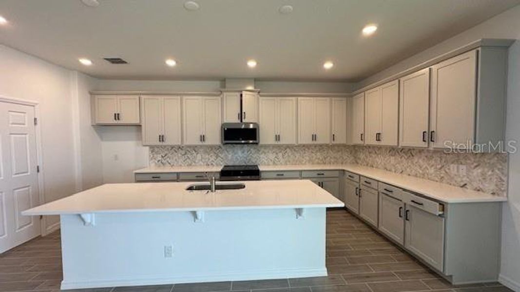 Furnished interior view inside a new home in Cypress Bluff, Groveland (Image 3).