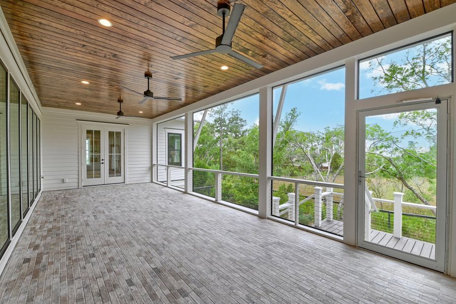 Exterior details and patio area of a home in Daniel Island Park, Charleston (Image 32).