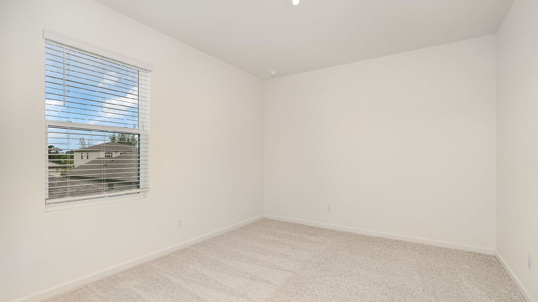 Representative unfurnished interior of a home built from the Hayden by D.R. Horton in Morningside, Fort Pierce (Image 24).