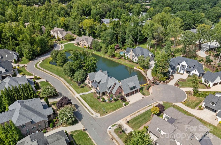 Front exterior of a new home in , Cornelius, NC, highlighting curb appeal (Image 19). Front exterior of a new home in , Cornelius, NC, highlighting curb appeal (Image 19).