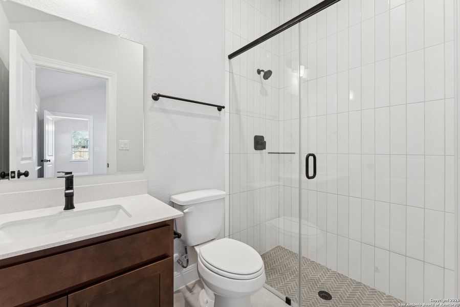 Furnished interior view inside a new home in Davis Ranch 60', San Antonio (Image 9).