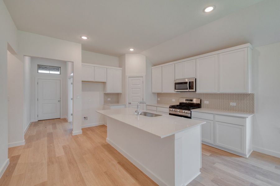 Furnished interior view inside a new home in Prairie Winds, Hutto (Image 6).