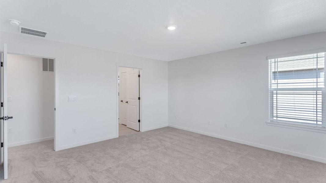 Representative unfurnished interior of a home built from the Calhan by D.R. Horton in Vantage, Berthoud (Image 22).