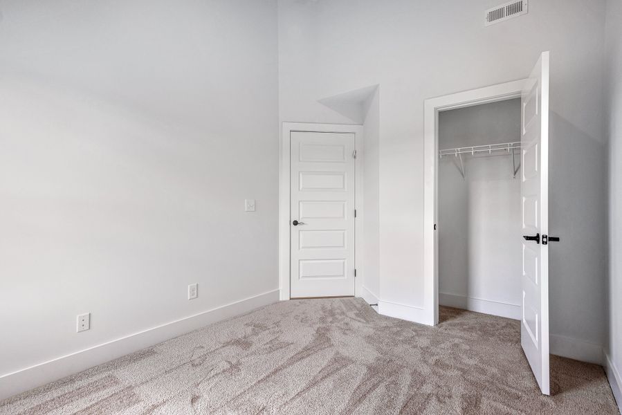 Representative unfurnished interior of a home built from the Ingram Rowhome by Parkside Builders in Anderson Park, Hendersonville (Image 43).