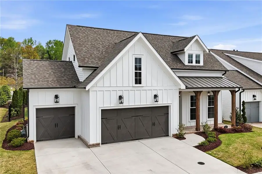 Front exterior of a new home in , Canton, GA, highlighting curb appeal (Image 2). Front exterior of a new home in , Canton, GA, highlighting curb appeal (Image 2).