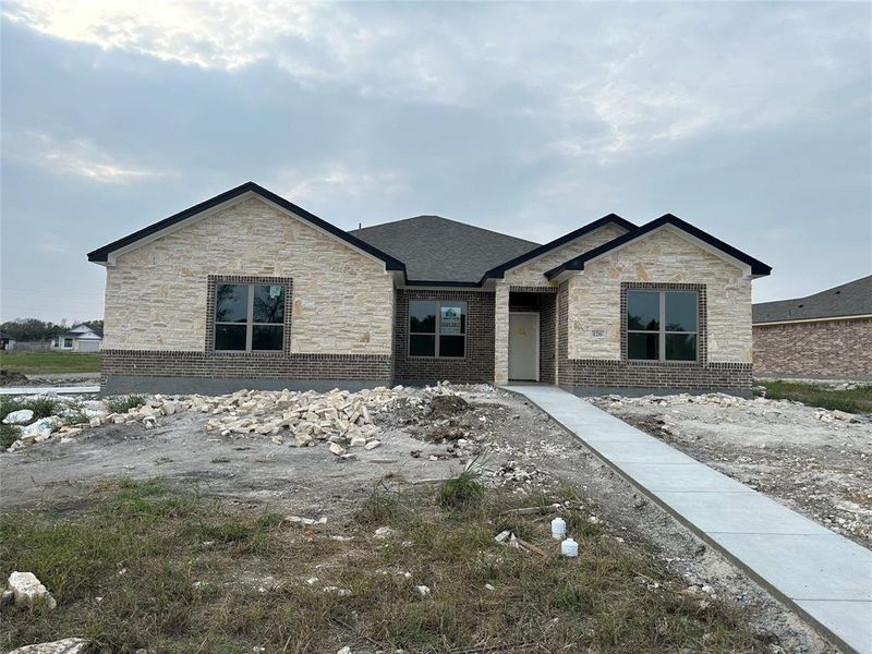 View of front of property with stone siding
