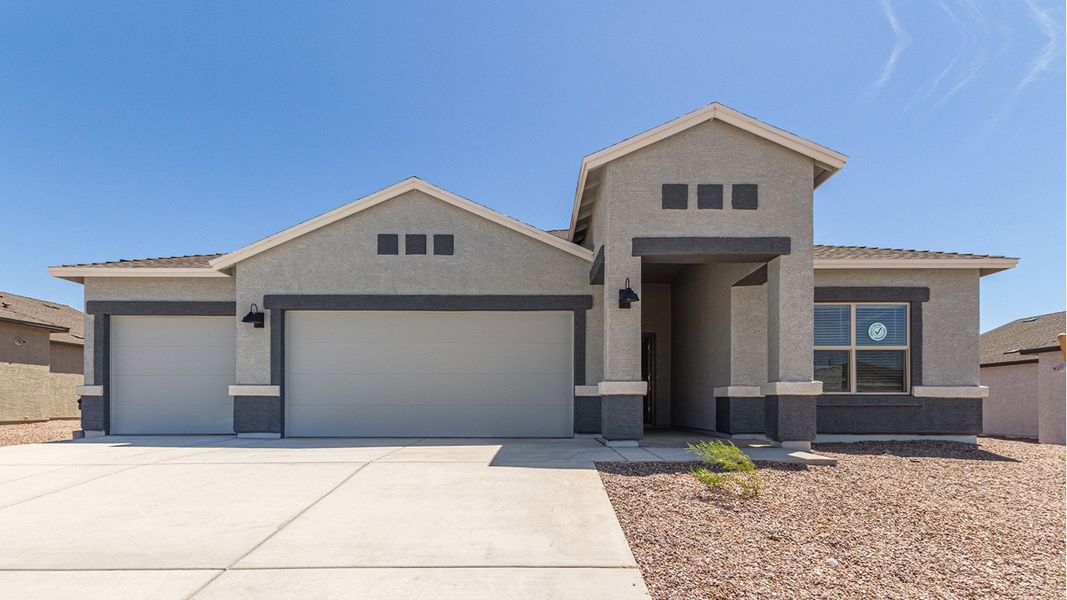 Front exterior of a new home in Sycamore Vista, Vail, AZ, highlighting curb appeal (Image 2).
