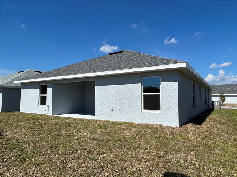 Exterior details and patio area of a home in Watercress Cove, North Port (Image 3).