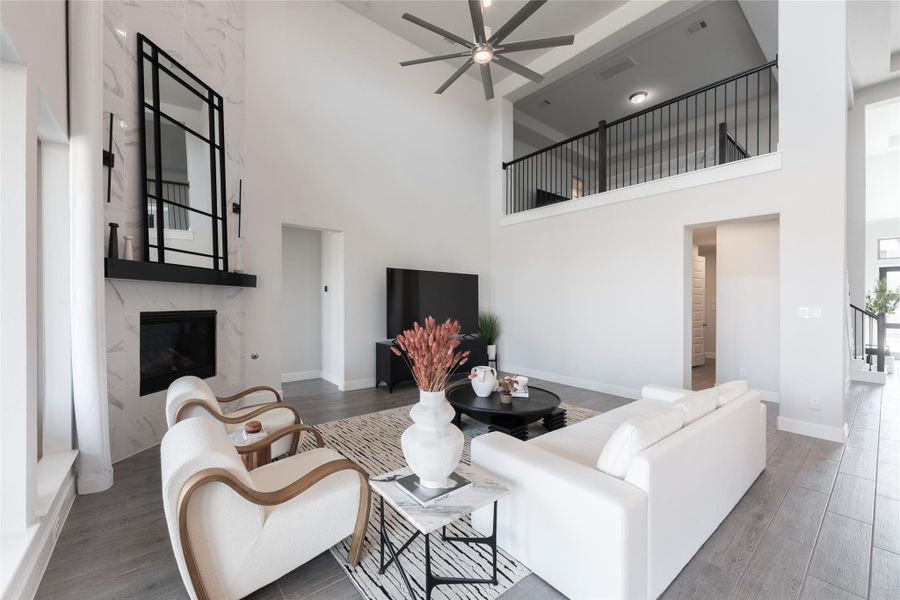 Modern fireplace, and an elegant mezzanine. Compliment the open to below concept that everyone loves!! Modern fireplace, and an elegant mezzanine. Compliment the open to below concept that everyone loves!!