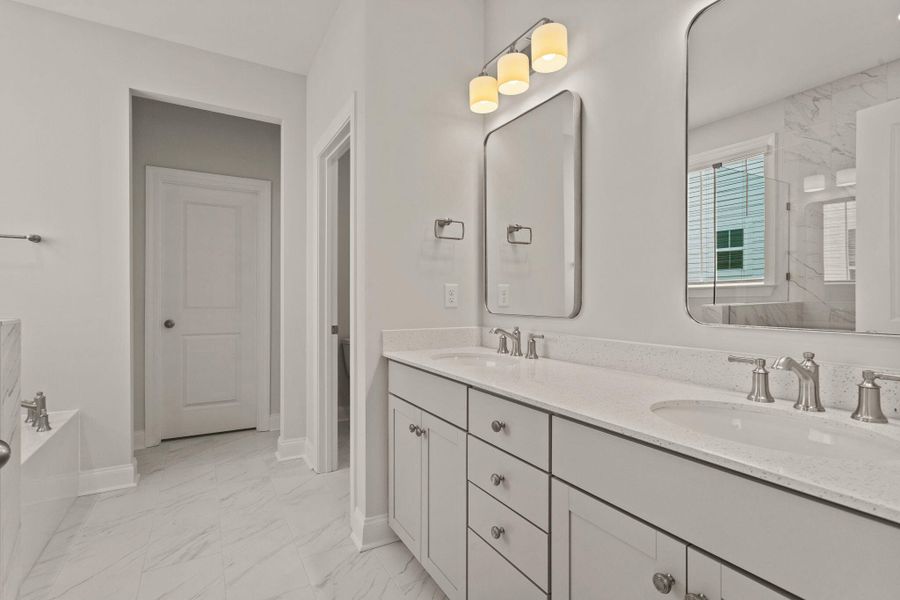 Furnished interior view inside a new home in Tidewater at Lakes of Cane Bay, Summerville (Image 11).