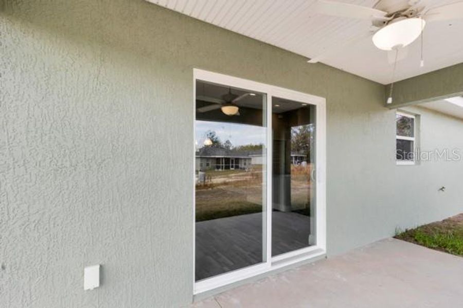 Exterior details and patio area of a home in , Ocala (Image 4).