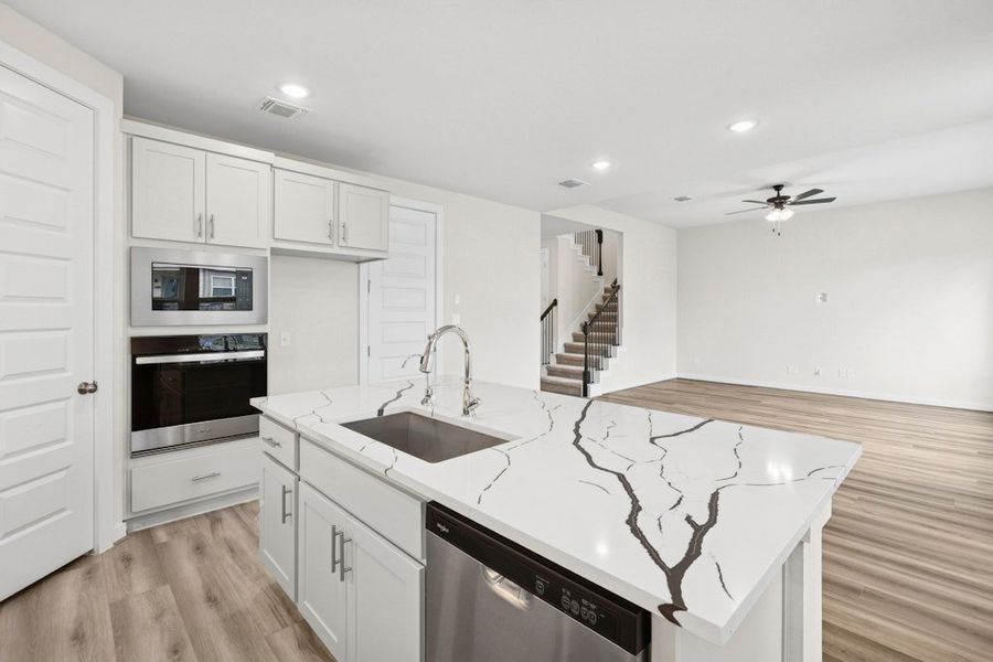 Furnished interior view inside a new home in University Heights, Round Rock (Image 8).