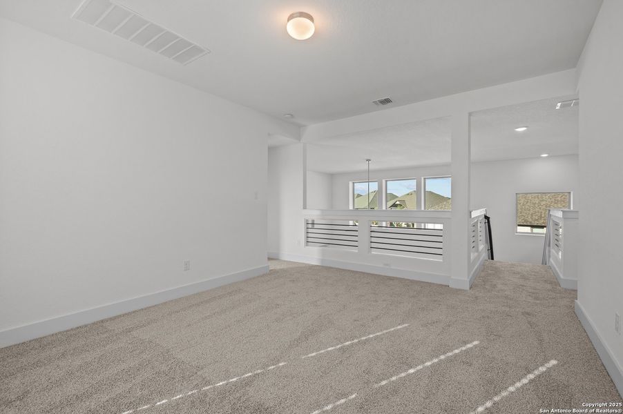 Spacious, unfurnished interior of a new home in Stillwater Ranch, San Antonio (Image 27).