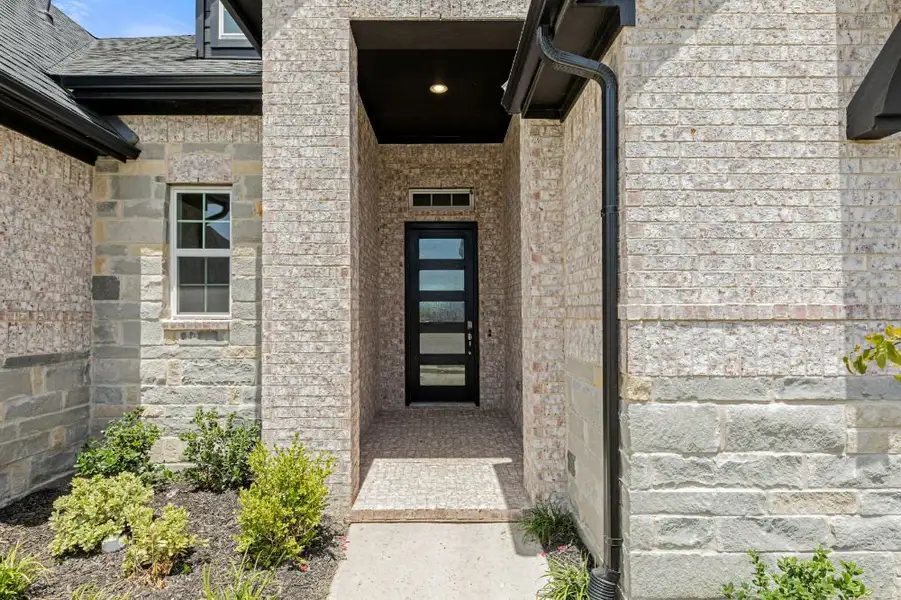 Representative exterior details of a home built from the Grayson by UnionMain Homes in Cambridge Crossing, Celina (Image 3).
