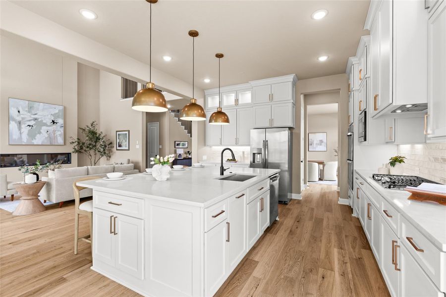 Never feel left out of the conversation! Your family and guests can easily mingle between the airy living room and expansive kitchen. *Virtually Staged*