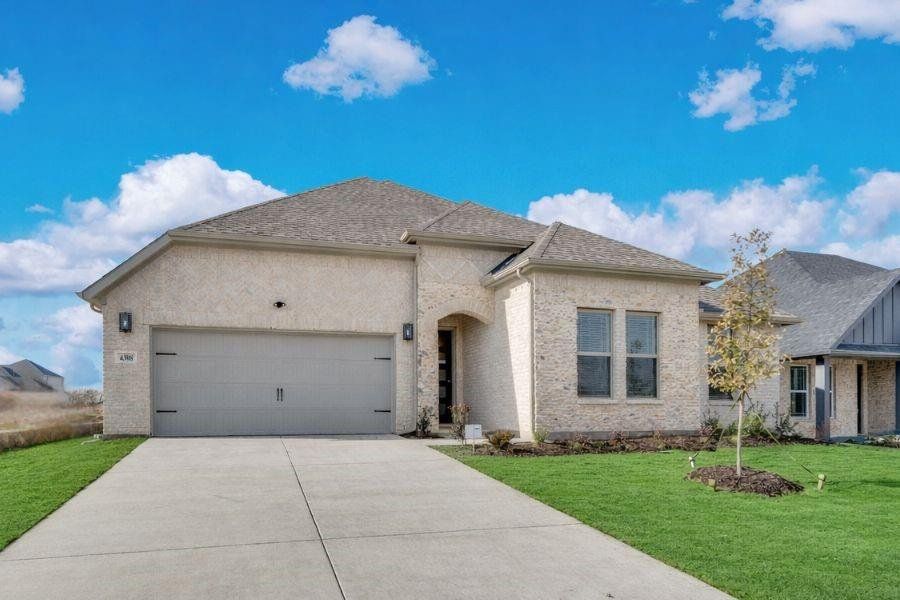 Front exterior of a new home in Westside Preserve, Midlothian, TX, highlighting curb appeal (Image 18).