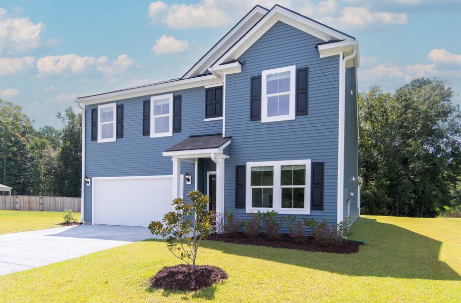 Front exterior of a new home in , Johns Island, SC, highlighting curb appeal (Image 2).