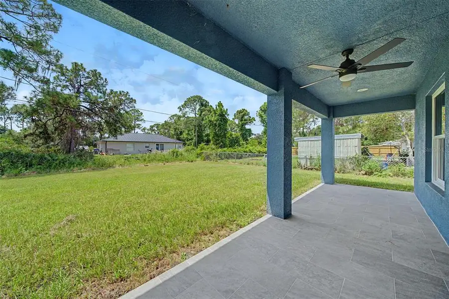 Exterior details and patio area of a home in , Sebring (Image 3). Exterior details and patio area of a home in , Sebring (Image 3).