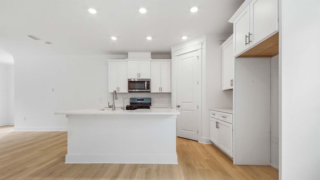 Furnished interior view inside a new home in Breakfast Point East Phase I, Panama City Beach (Image 6).