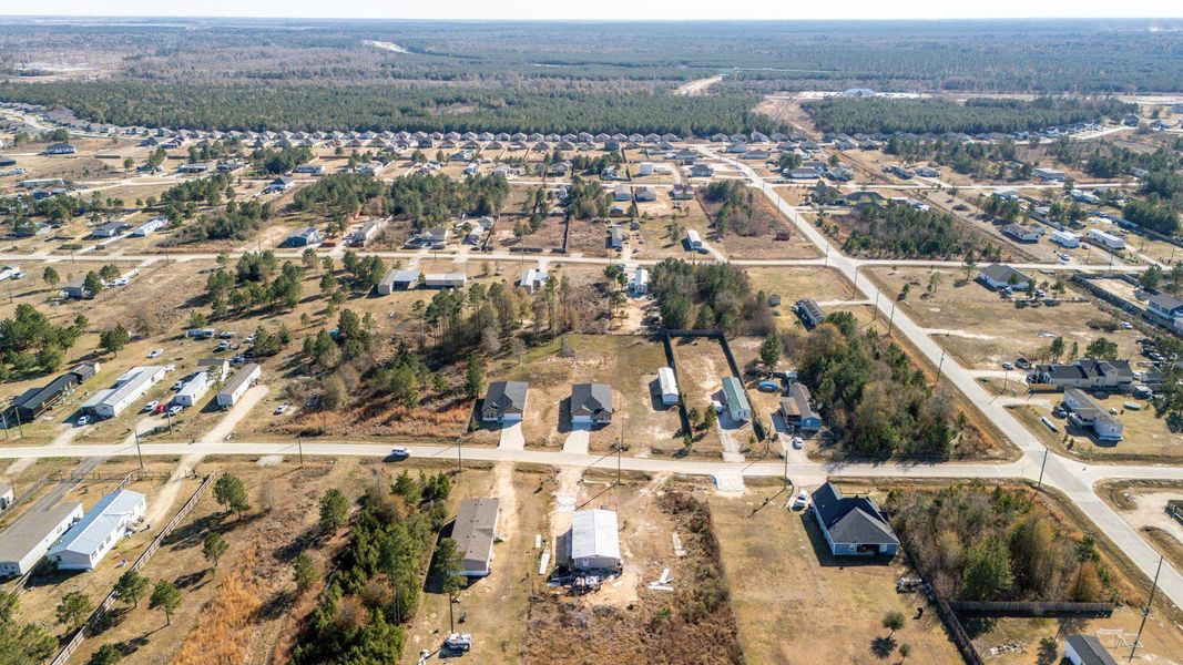 Discover the expansive layout and tranquil charm of this vibrant community from above. Discover the expansive layout and tranquil charm of this vibrant community from above.