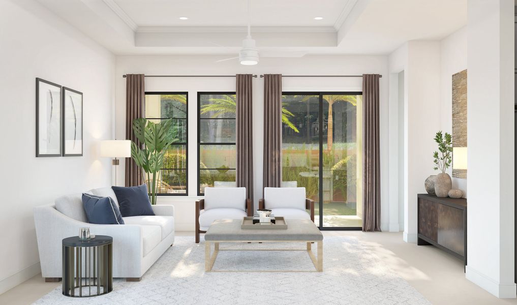 Great room with coffered ceiling and crown moulding
