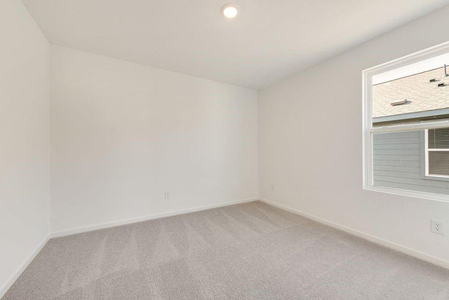 Unfurnished room featuring recessed lighting, baseboards, and light colored carpet