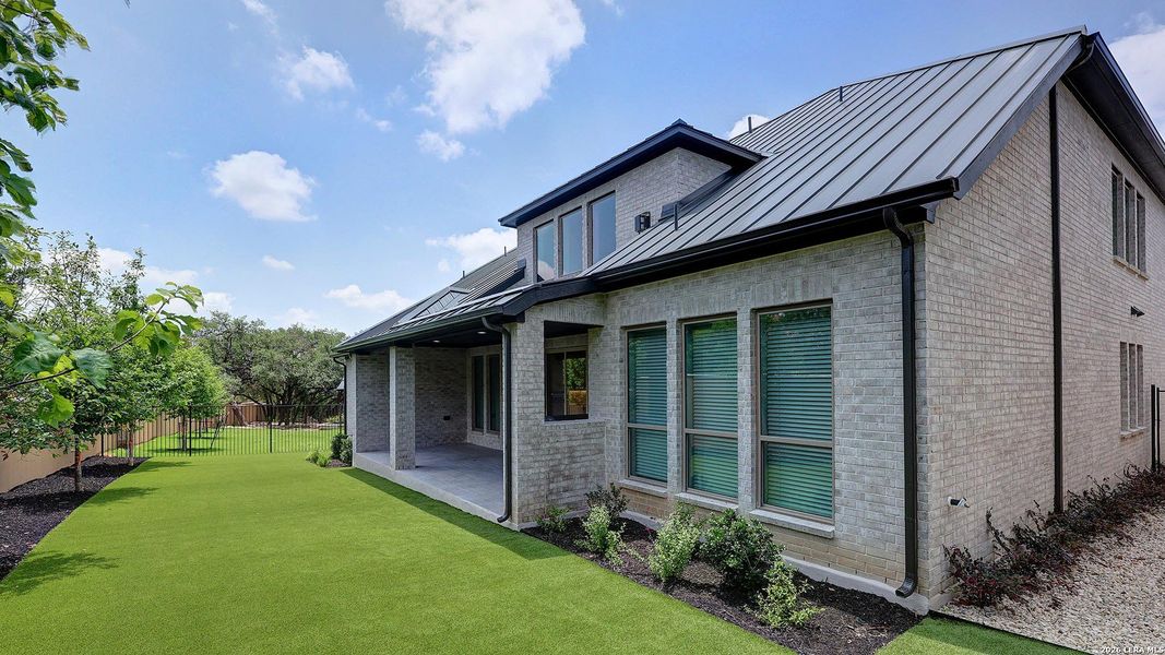 Exterior details and patio area of a home in The Dominion, San Antonio (Image 3).