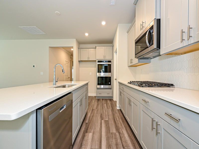 Enjoy your morning coffee at the kitchen island.