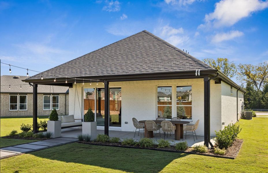 Exterior details and patio area of a home in Del Webb at Trinity Falls, McKinney (Image 3).