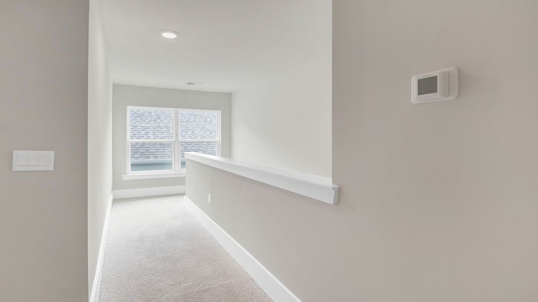 Spacious, unfurnished interior of a new home in Sease's Pond, Gilbert (Image 23).