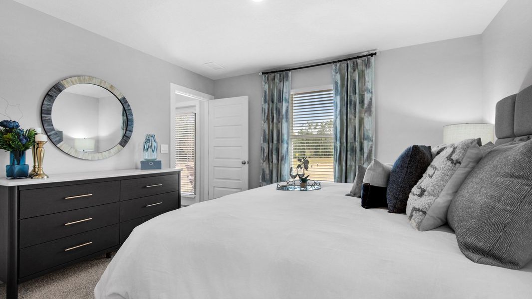 Representative furnished interior of a home built from the Delilah by D.R. Horton in Colonial East, Panama City Beach (Image 23).