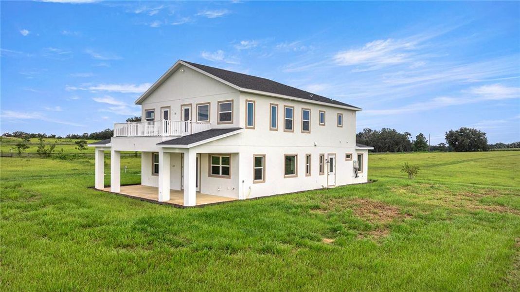 Front exterior of a new home in , Morriston, FL, highlighting curb appeal (Image 32). Front exterior of a new home in , Morriston, FL, highlighting curb appeal (Image 32).