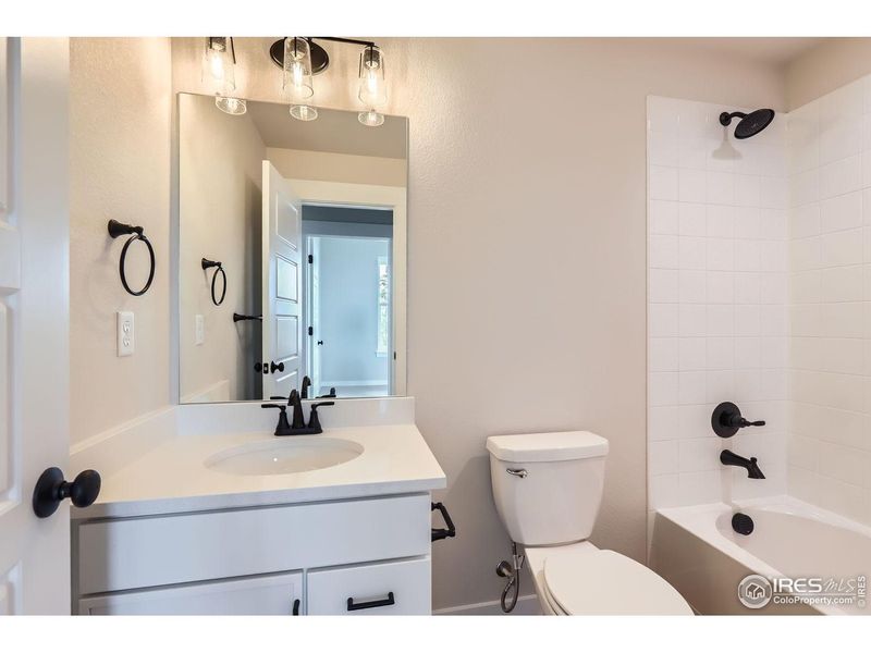 Furnished interior view inside a new home in Barefoot Lakes, Longmont (Image 12). Furnished interior view inside a new home in Barefoot Lakes, Longmont (Image 12).