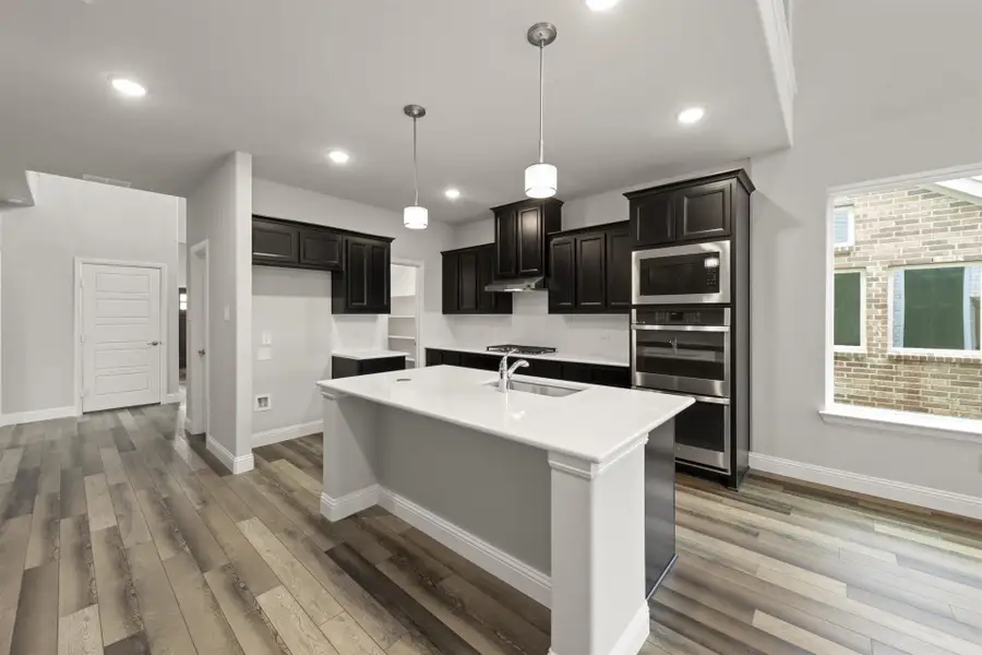 Representative furnished interior of a home built from the Fairmont by Pacesetter Homes in Sutton Fields, Celina (Image 5).