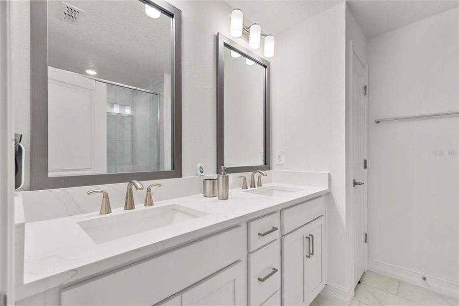 Furnished interior view inside a new home in Townes at Manhattan Crossing, Tampa (Image 19).