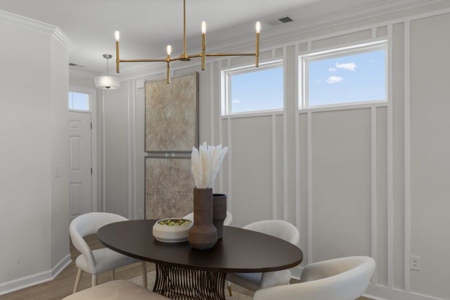 Representative furnished interior of a home built from the The Sunflower by Chesapeake Homes in Coastal Club of the Carolinas, Calabash (Image 10).