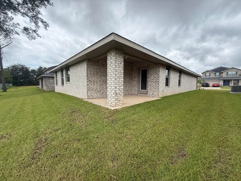 Front exterior of a new home in Ridgeway Landing, Crestview, FL, highlighting curb appeal (Image 9).