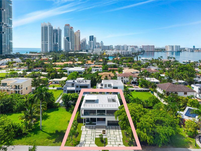 Front exterior of a new home in , Sunny Isles Beach, FL, highlighting curb appeal (Image 19).