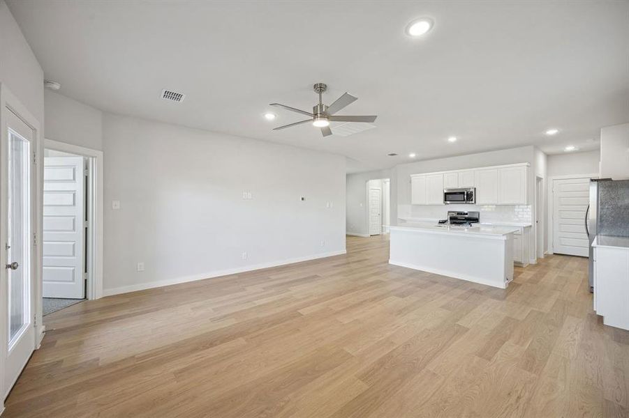 Living Room in the Oak II home plan by Trophy Signature Homes – REPRESENTATIVE PHOTO