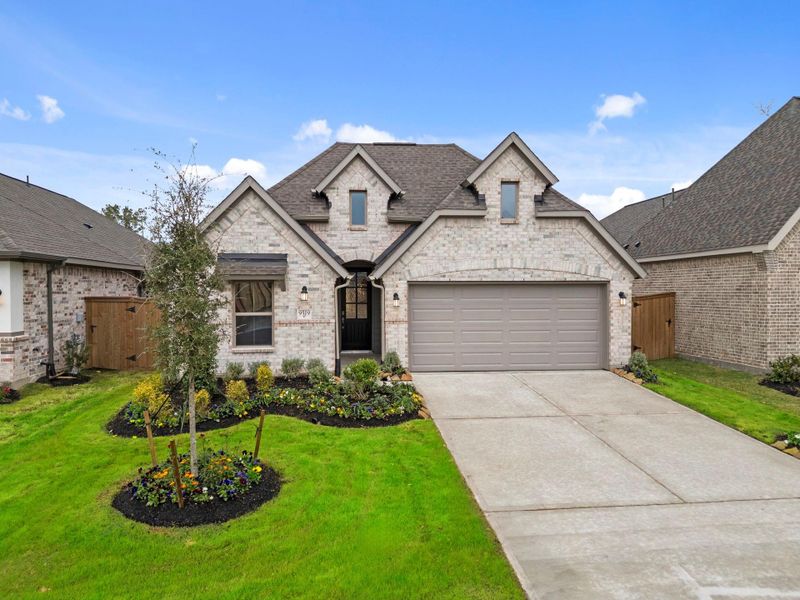 Front exterior of a new home in The Highlands, Porter, TX, highlighting curb appeal (Image 21).