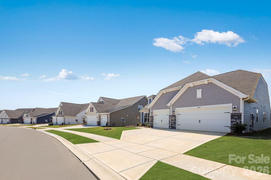 Front exterior of a new home in Roselyn, Lancaster, SC, highlighting curb appeal (Image 19). Front exterior of a new home in Roselyn, Lancaster, SC, highlighting curb appeal (Image 19).