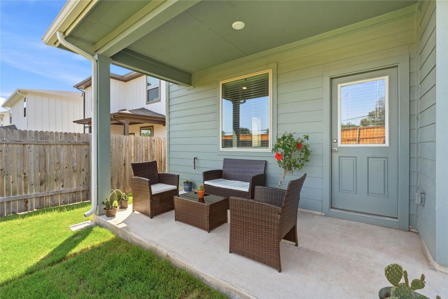 Exterior details and patio area of a home in Crosswinds, Kyle (Image 3).