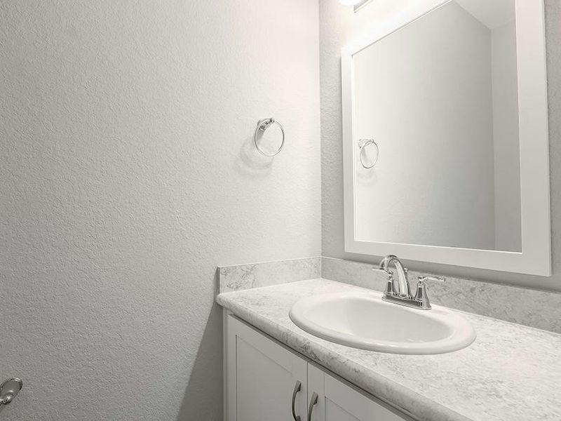 And, this home also includes a powder room - Photos showcase a home with similar finishes, not the actual home for sale.