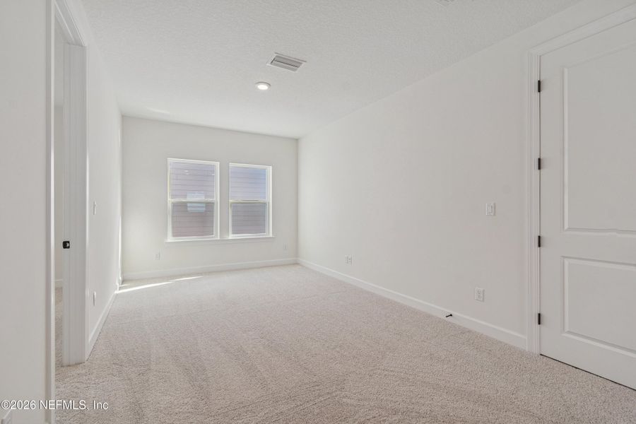 Spacious, unfurnished interior of a new home in Evergreen Island at Silverleaf - Executive, St. Augustine (Image 26).