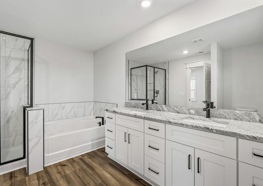 The master bath includes a walk-in shower.