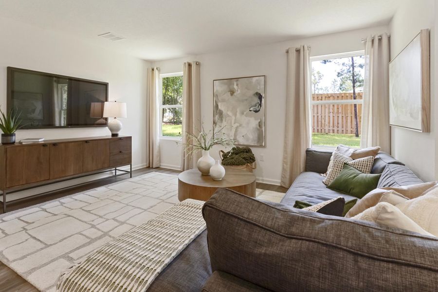 A living room with a couch and a coffee table.