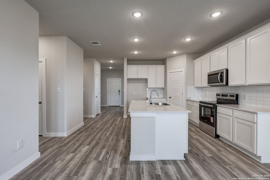 Furnished interior view inside a new home in Cinco Lakes, San Antonio (Image 8).