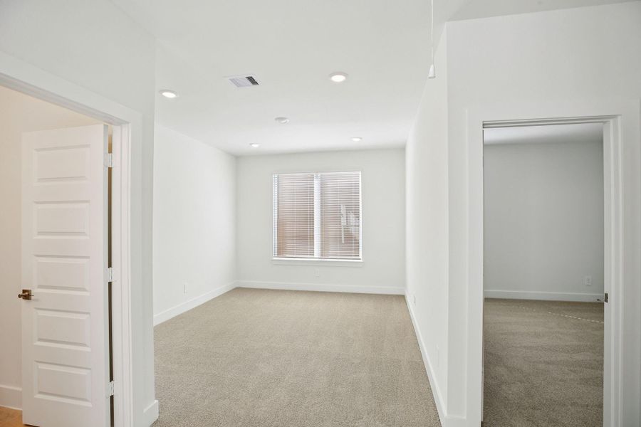 Spacious, unfurnished interior of a new home in Pinewood Trails - Luxe Series, Houston (Image 23).