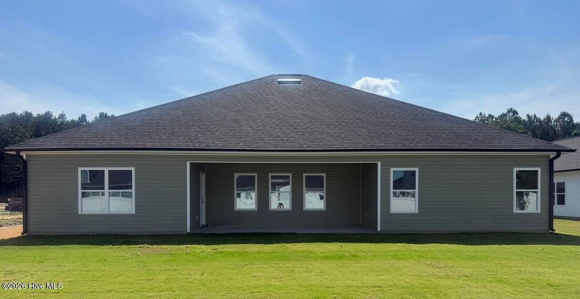 Exterior details and patio area of a home in Summer Place, Grimesland (Image 10).