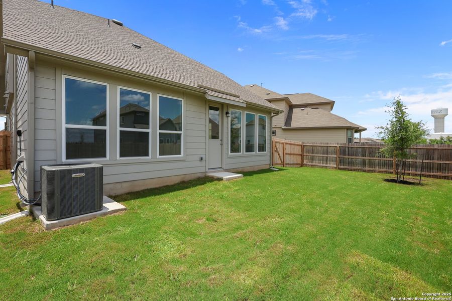 Front exterior of a new home in Rhine Valley, Schertz, TX, highlighting curb appeal (Image 19).